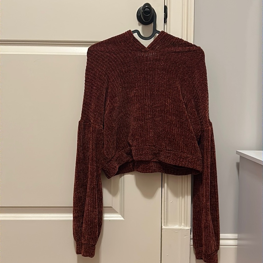 The brand of this sweatshirt Gypsies and  moondust  and hardly ever worn